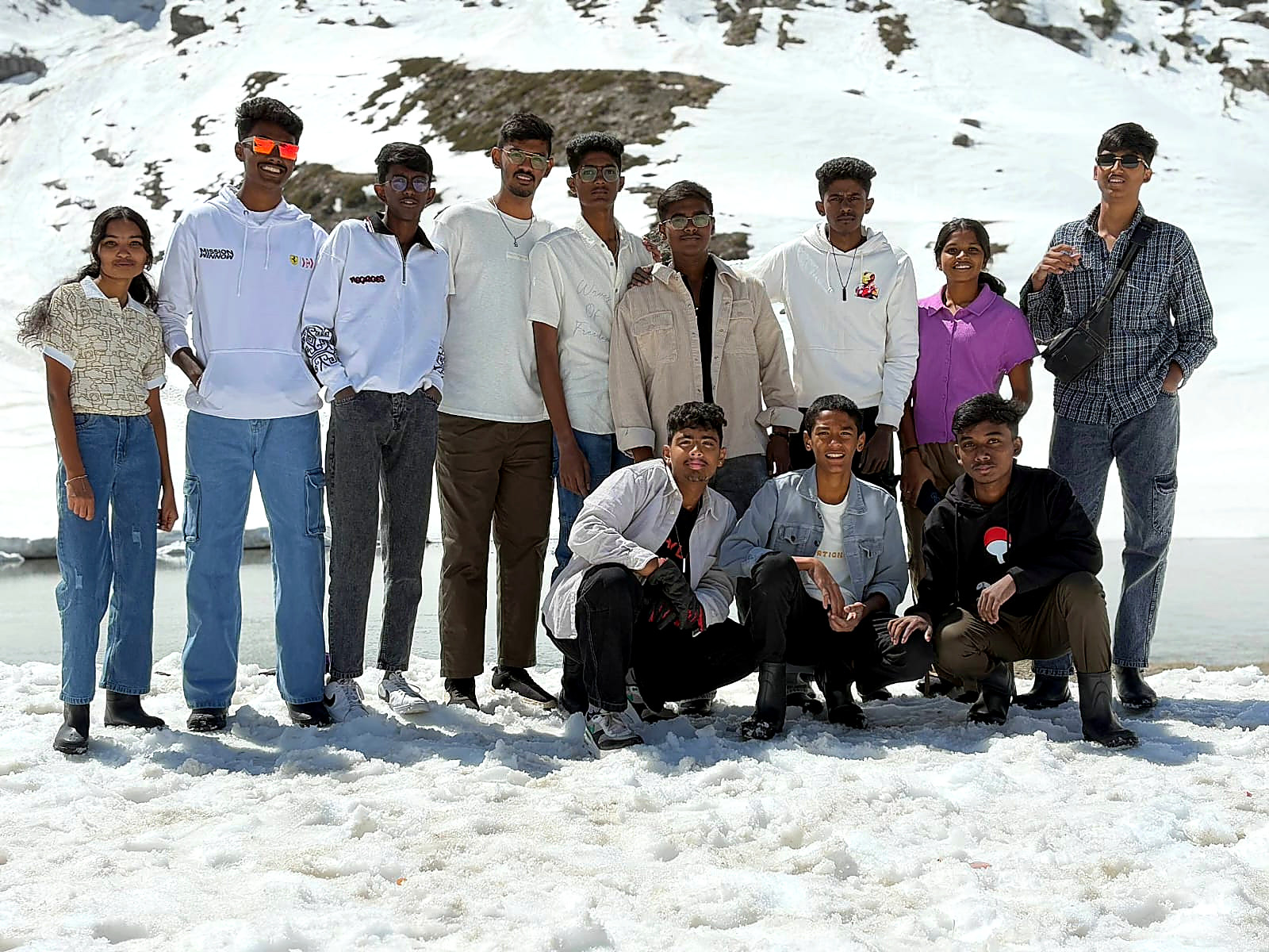 Yuva Yathra travellers together in a snowy mountain landscape